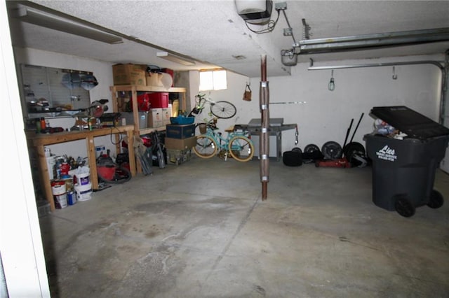 garage featuring a garage door opener