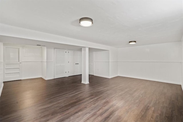 finished basement with wood finished floors and baseboards