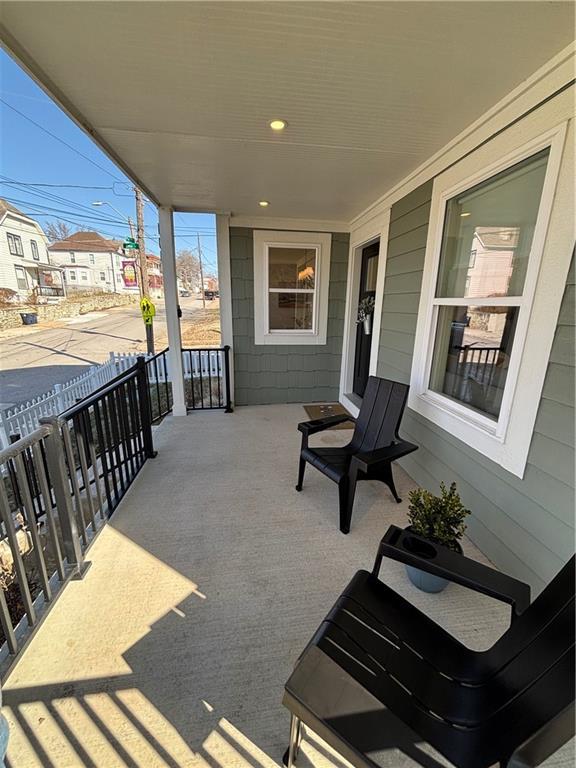 view of patio featuring a porch