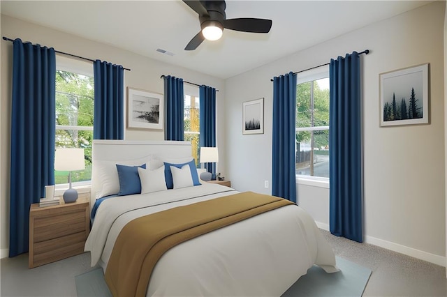 bedroom with a ceiling fan, visible vents, and baseboards