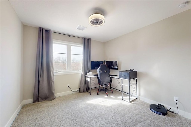 home office featuring visible vents, baseboards, and carpet flooring