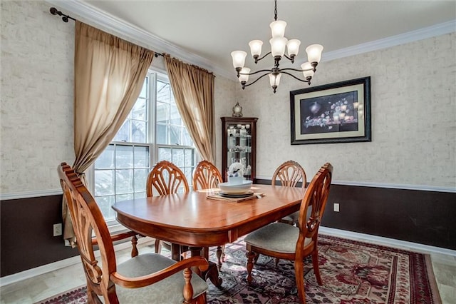 dining room featuring a chandelier, wallpapered walls, baseboards, and ornamental molding