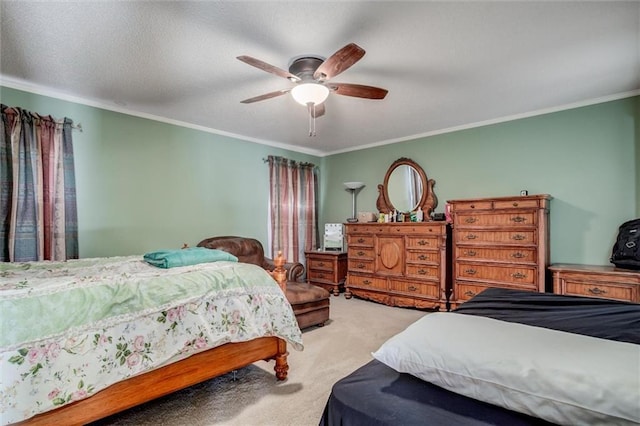 carpeted bedroom featuring a ceiling fan, crown molding, and a textured ceiling