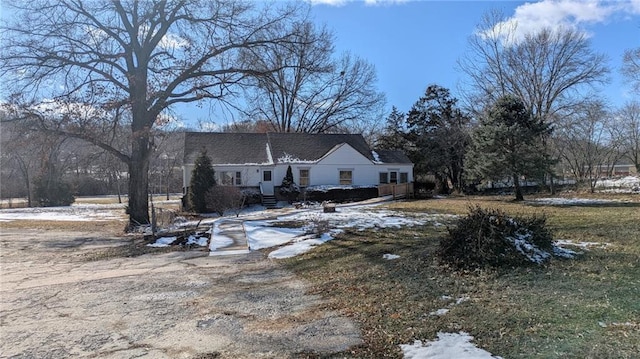 view of snow covered house