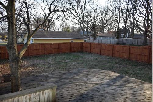 deck featuring a fenced backyard