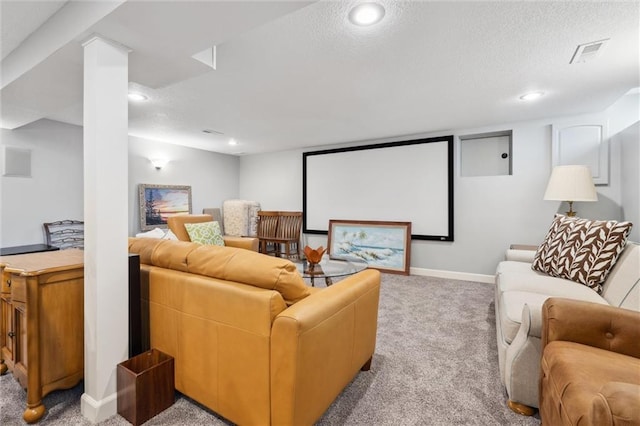 home theater room with visible vents, a textured ceiling, recessed lighting, carpet, and baseboards