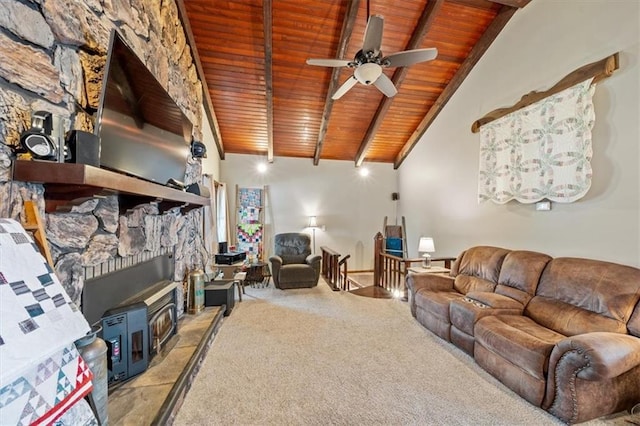 living area featuring beamed ceiling, light colored carpet, and wooden ceiling