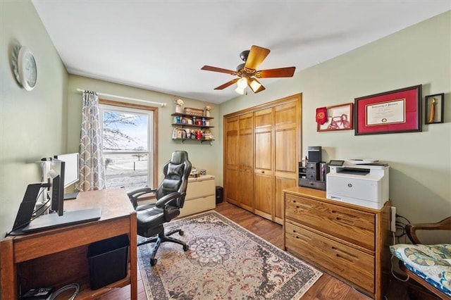 office featuring a ceiling fan and wood finished floors