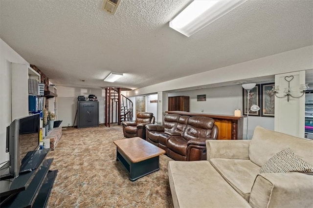 carpeted living area featuring stairway, a textured ceiling, and visible vents