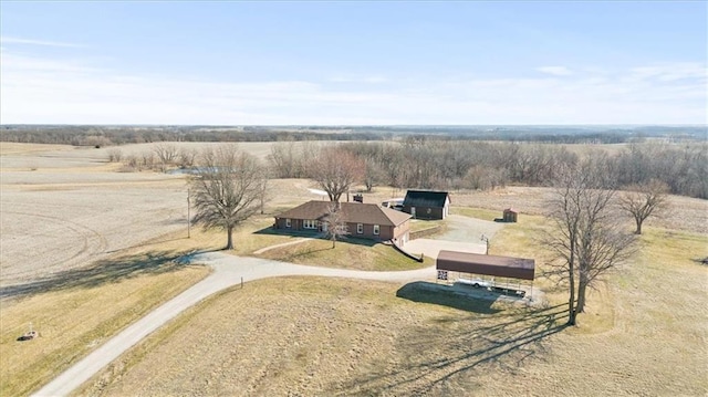 birds eye view of property featuring a rural view