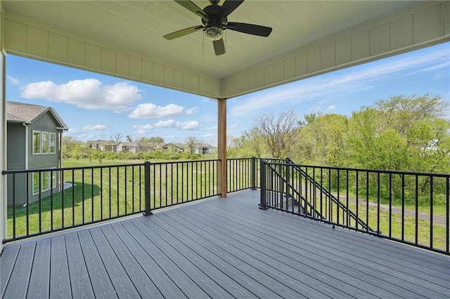 1506 NW 106th Ter, Kansas City, MO 64155 - wooden deck with a lawn and ceiling fan