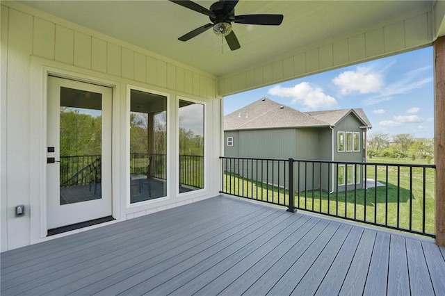 1506 NW 106th Ter, Kansas City, MO 64155 - deck with a ceiling fan and a yard
