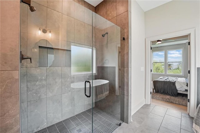 1506 NW 106th Ter, Kansas City, MO 64155 - ensuite bathroom with a ceiling fan, a stall shower, and connected bathroom