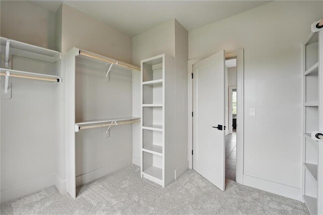 1506 NW 106th Ter, Kansas City, MO 64155 - spacious closet with carpet flooring