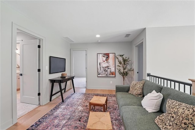 1506 NW 106th Ter, Kansas City, MO 64155 - living area with recessed lighting, visible vents, and light wood-type flooring