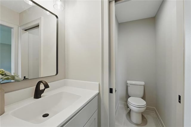 1506 NW 106th Ter, Kansas City, MO 64155 - bathroom with vanity, baseboards, tile patterned flooring, and toilet