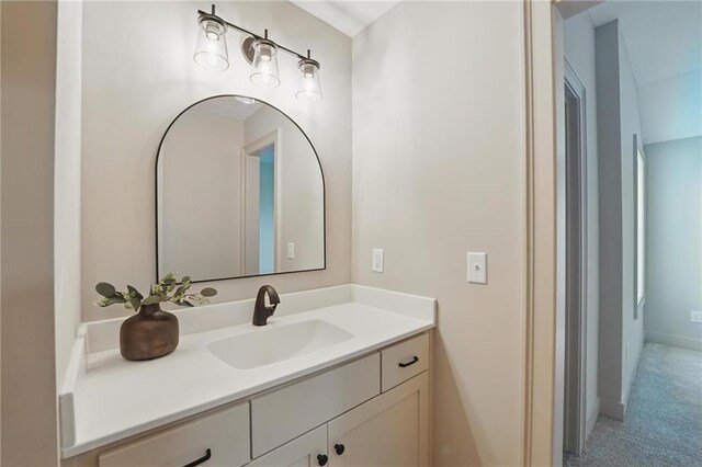 1506 NW 106th Ter, Kansas City, MO 64155 - bathroom with vanity and baseboards