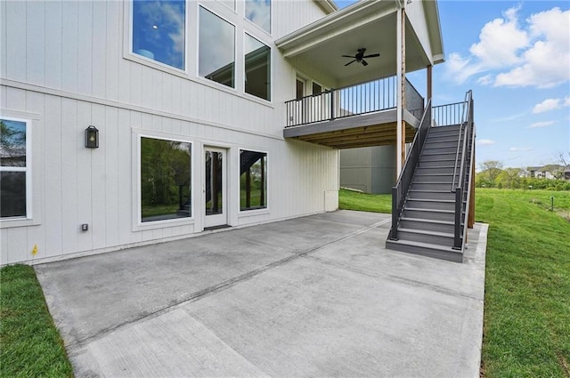 1506 NW 106th Ter, Kansas City, MO 64155 - exterior space with a ceiling fan, a patio, a yard, and stairway