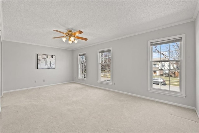 unfurnished room with light carpet, baseboards, and ornamental molding