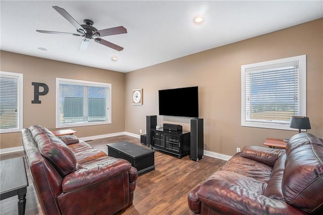 living area featuring recessed lighting, wood finished floors, a ceiling fan, and baseboards