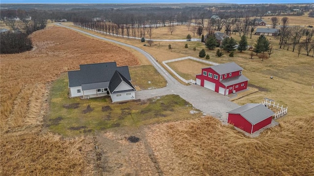 birds eye view of property featuring a rural view