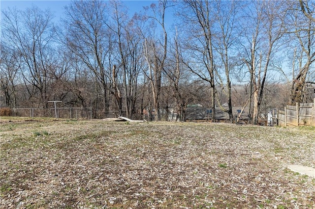 view of yard with fence