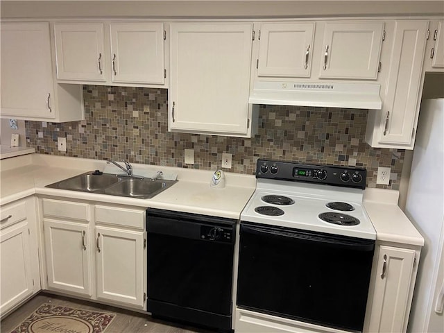 kitchen with under cabinet range hood, range with electric cooktop, a sink, black dishwasher, and backsplash