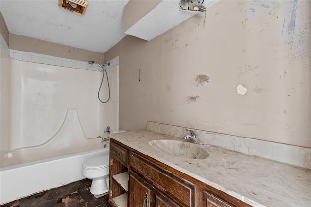 full bath featuring a textured ceiling, bathtub / shower combination, vanity, and toilet