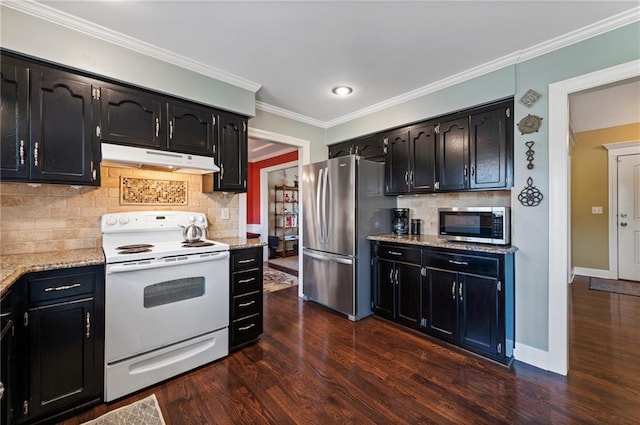 kitchen featuring dark cabinetry, dark wood-style floors, under cabinet range hood, and stainless steel appliances