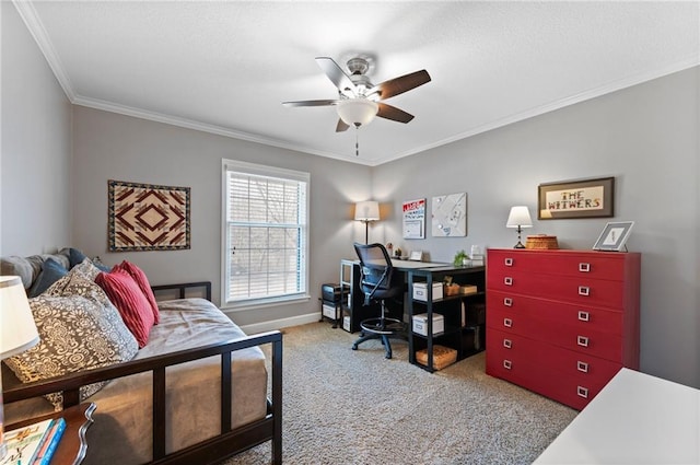 carpeted bedroom featuring baseboards, a ceiling fan, and crown molding