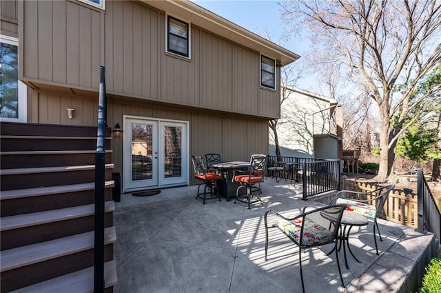 exterior space featuring outdoor dining space and french doors