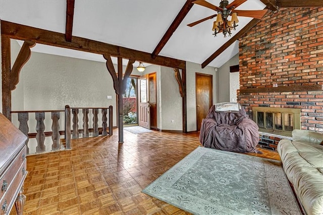 living area with high vaulted ceiling, a brick fireplace, beam ceiling, and baseboards