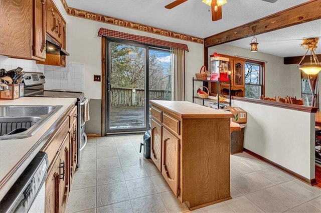 kitchen featuring brown cabinetry, electric stove, beamed ceiling, white dishwasher, and backsplash