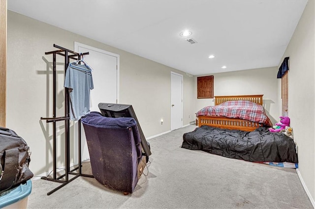 carpeted bedroom with baseboards, visible vents, and recessed lighting