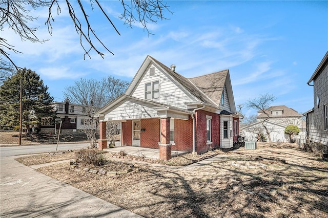 view of front of home with brick siding