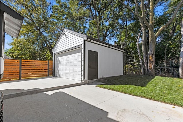 detached garage with fence