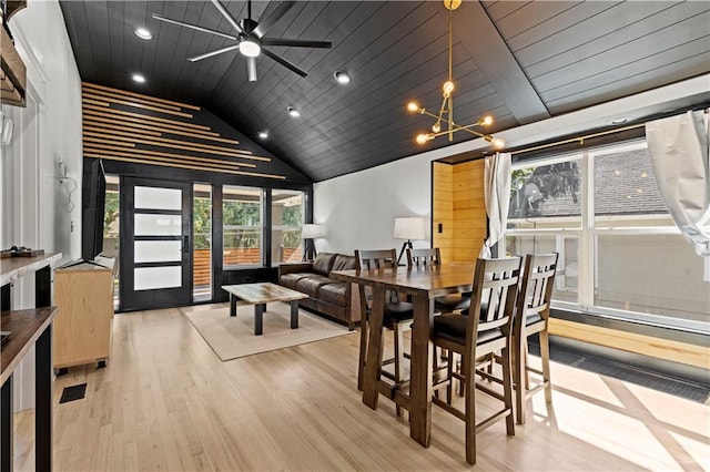 dining area with lofted ceiling, wooden ceiling, recessed lighting, a notable chandelier, and light wood-type flooring