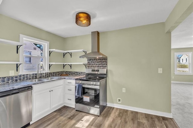 kitchen featuring open shelves, extractor fan, white cabinets, stainless steel appliances, and a sink