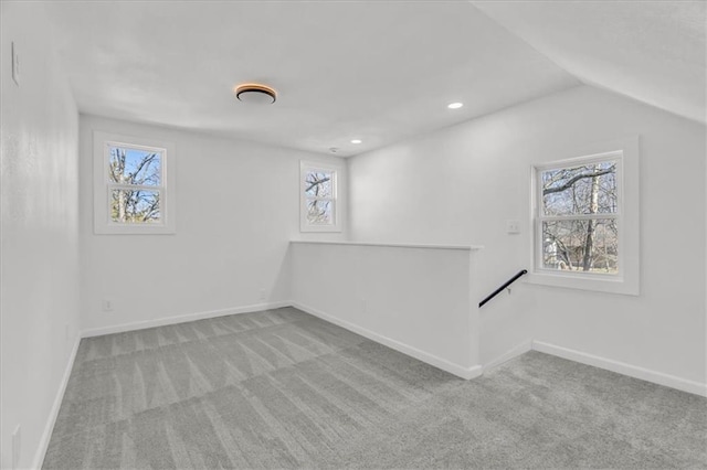 basement featuring recessed lighting, baseboards, and carpet floors