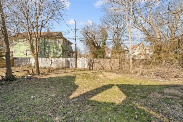 view of yard with fence