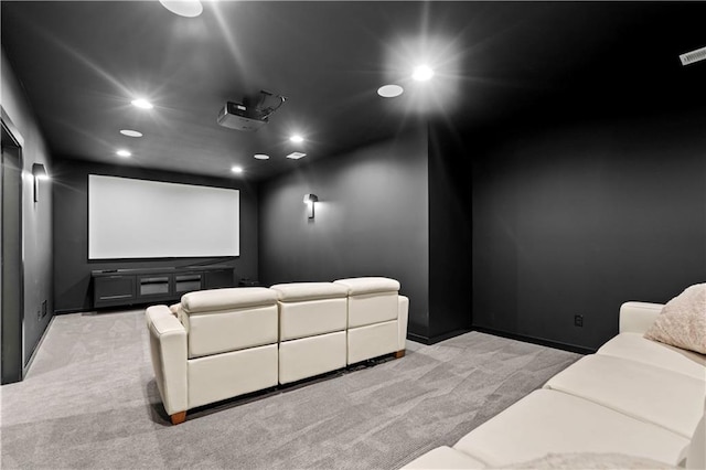 home theater room featuring recessed lighting, baseboards, and light colored carpet