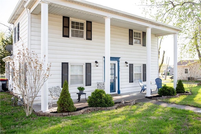 view of front facade with a porch and a front yard