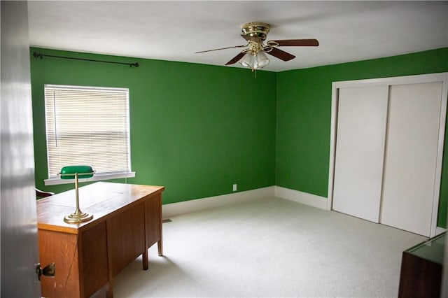 home office featuring ceiling fan and carpet flooring