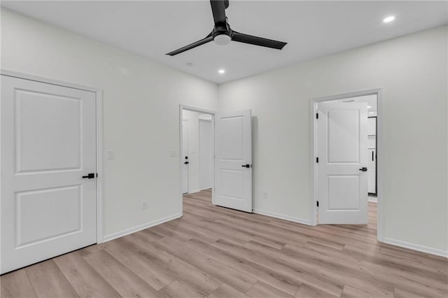 unfurnished bedroom featuring light wood finished floors, recessed lighting, a ceiling fan, and baseboards