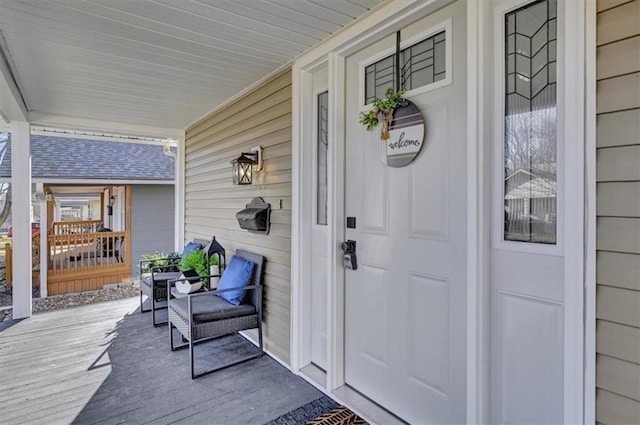 doorway to property featuring a porch