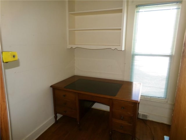 office area featuring dark wood-style flooring and baseboards