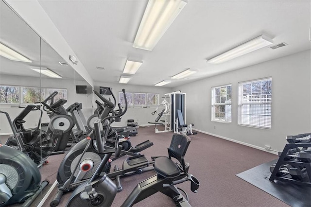 gym featuring visible vents and baseboards