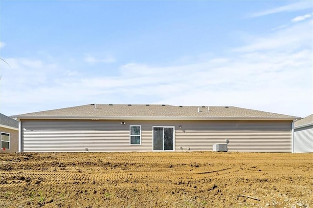 back of property with central air condition unit