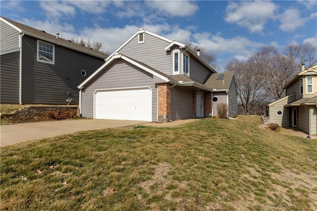 traditional-style home with a front yard, brick siding, and driveway