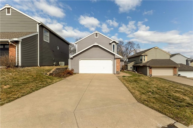 view of front of home with brick siding, central AC unit, concrete driveway, and a front lawn